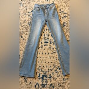 Classic Blue Women's Jeans with faded gold accents
